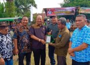 Tendangan Pertama Ketua KONI Langkat, Tanda Dibukanya KOTI CUP OPEN 2024 Desa Tanjung Ibus